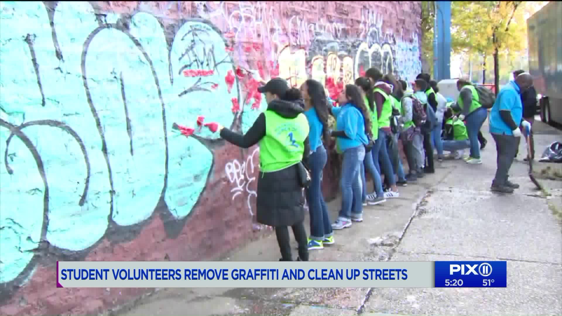 Student volunteers help remove graffiti and clean up Bronx streets