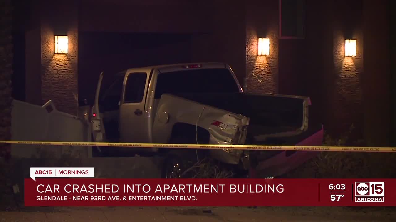 Driver at large after twovehicle crash into apartment building near
