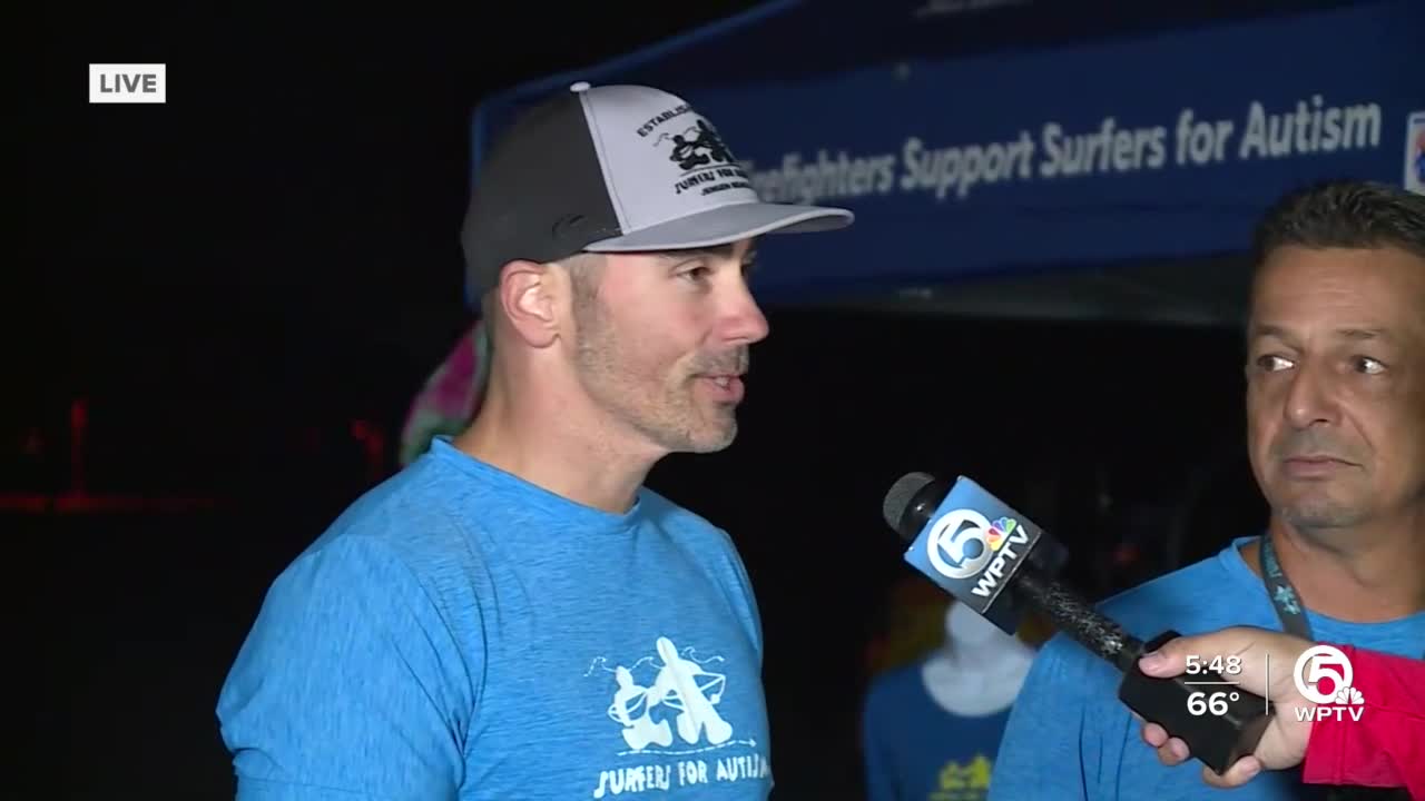 Surfers teach children with autism how to hang ten