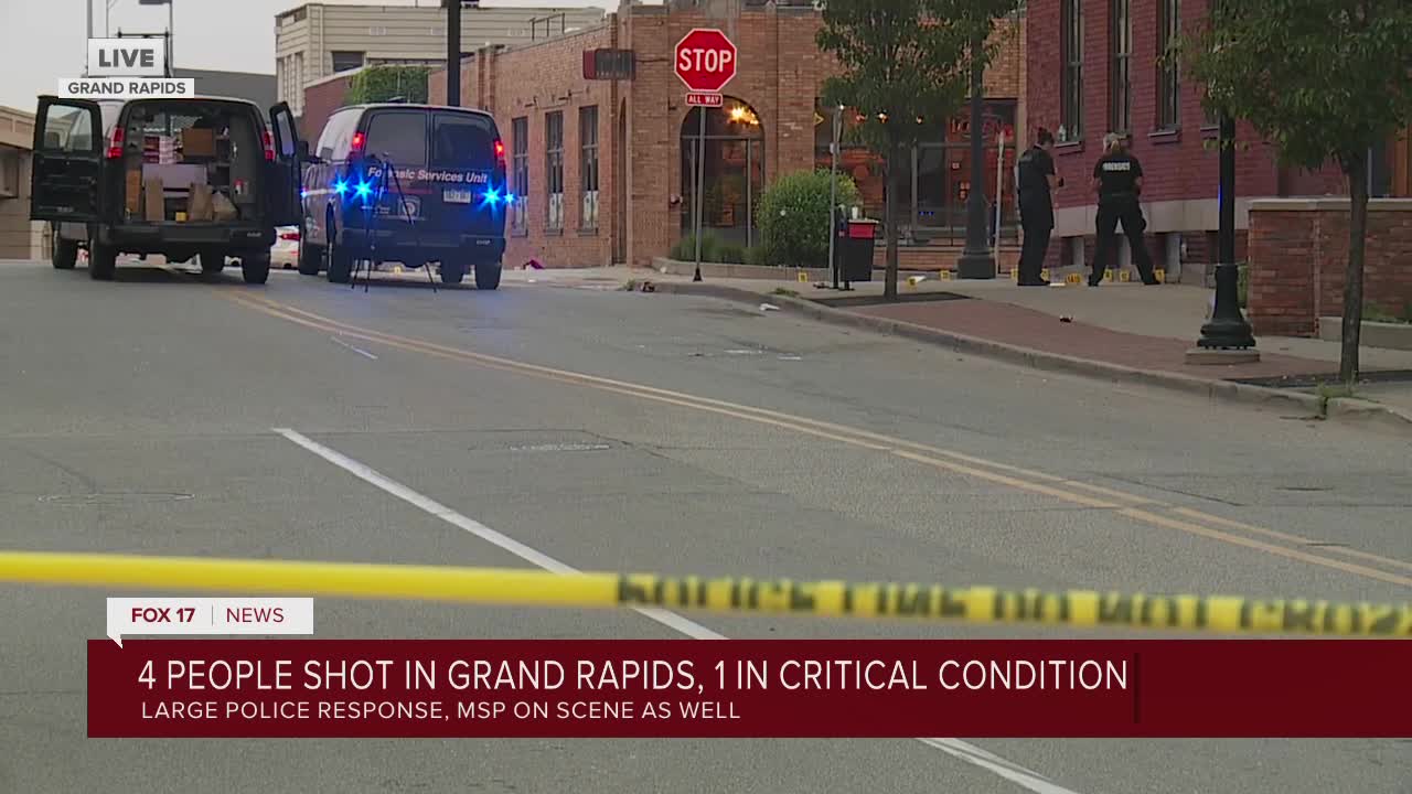'Bullets were flying everywhere' Four shot in downtown GR, suspect on