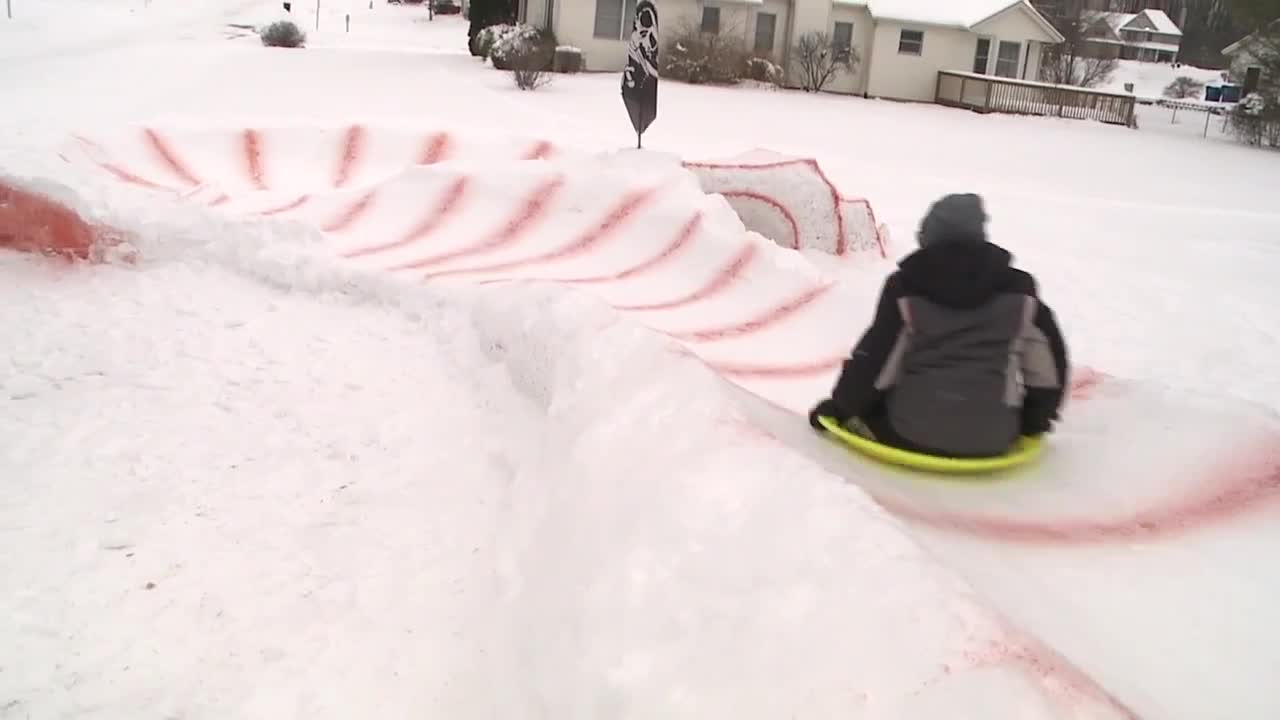 WATCH Kalamazoo family builds luge course in front yard